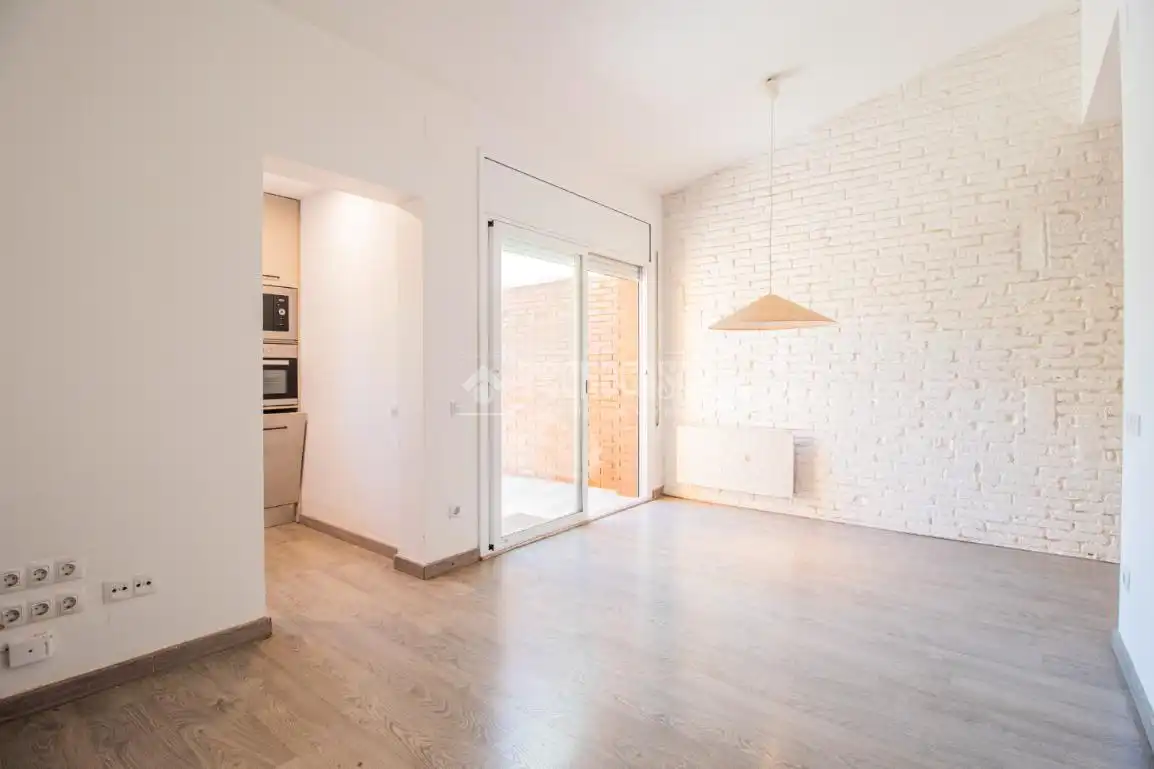 Sala de estar de Casa adosada en venta en Sant Cugat del Vallès con Calefacción y Terraza