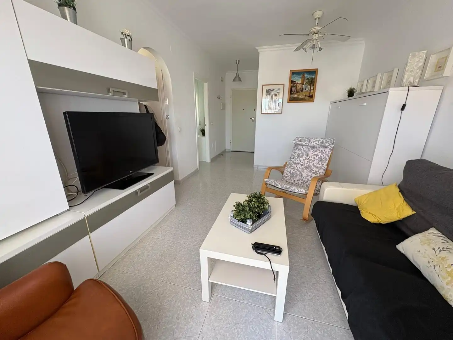 Sala de estar de Apartamento de alquiler en Torrox con Terraza y Piscina comunitaria