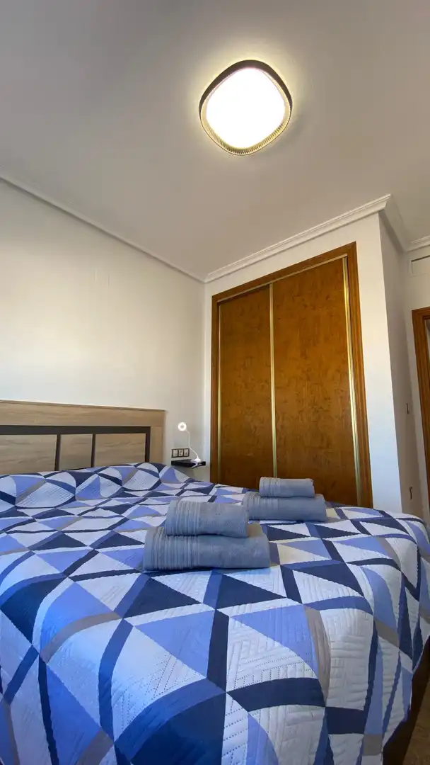 Habitación de Piso de alquiler en Rojales con Aire acondicionado, Terraza y Piscina comunitaria