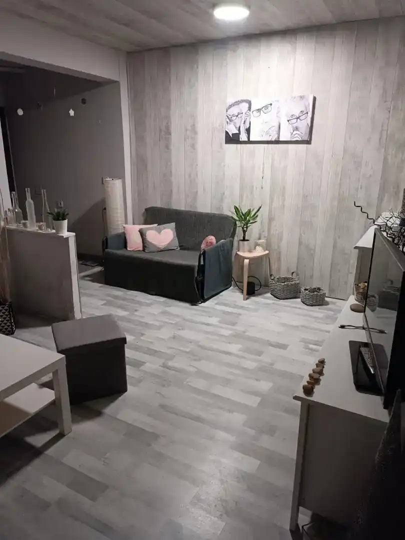 Sala d'estar de Casa adosada en venda en Escatrón amb Aire condicionat, Jardí privat i Moblat