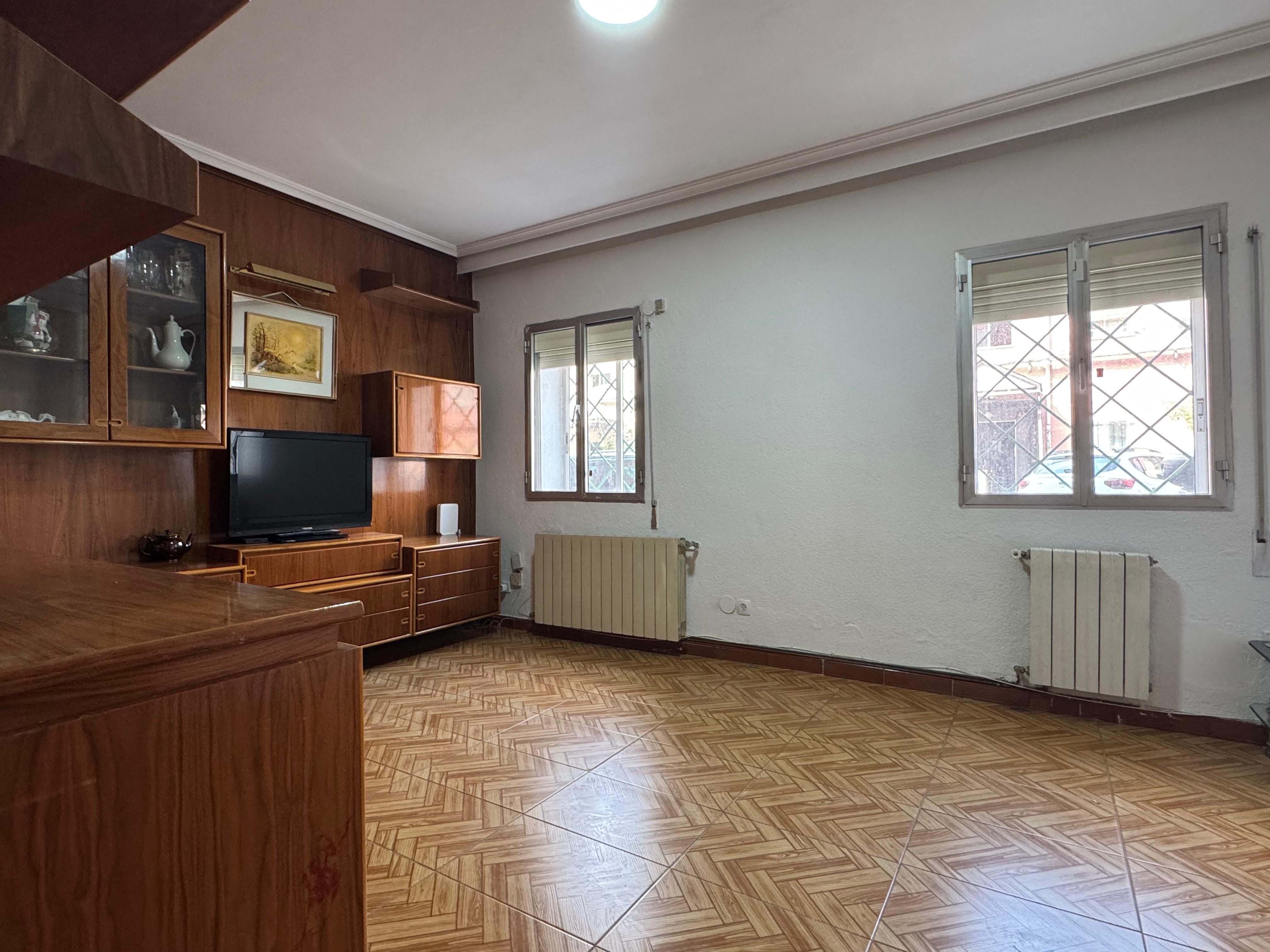 Living room of Flat for sale in  Madrid Capital  with Heating and Terrace