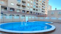 Swimming pool of Flat for sale in La Manga del Mar Menor  with Air Conditioner, Heating and Furnished