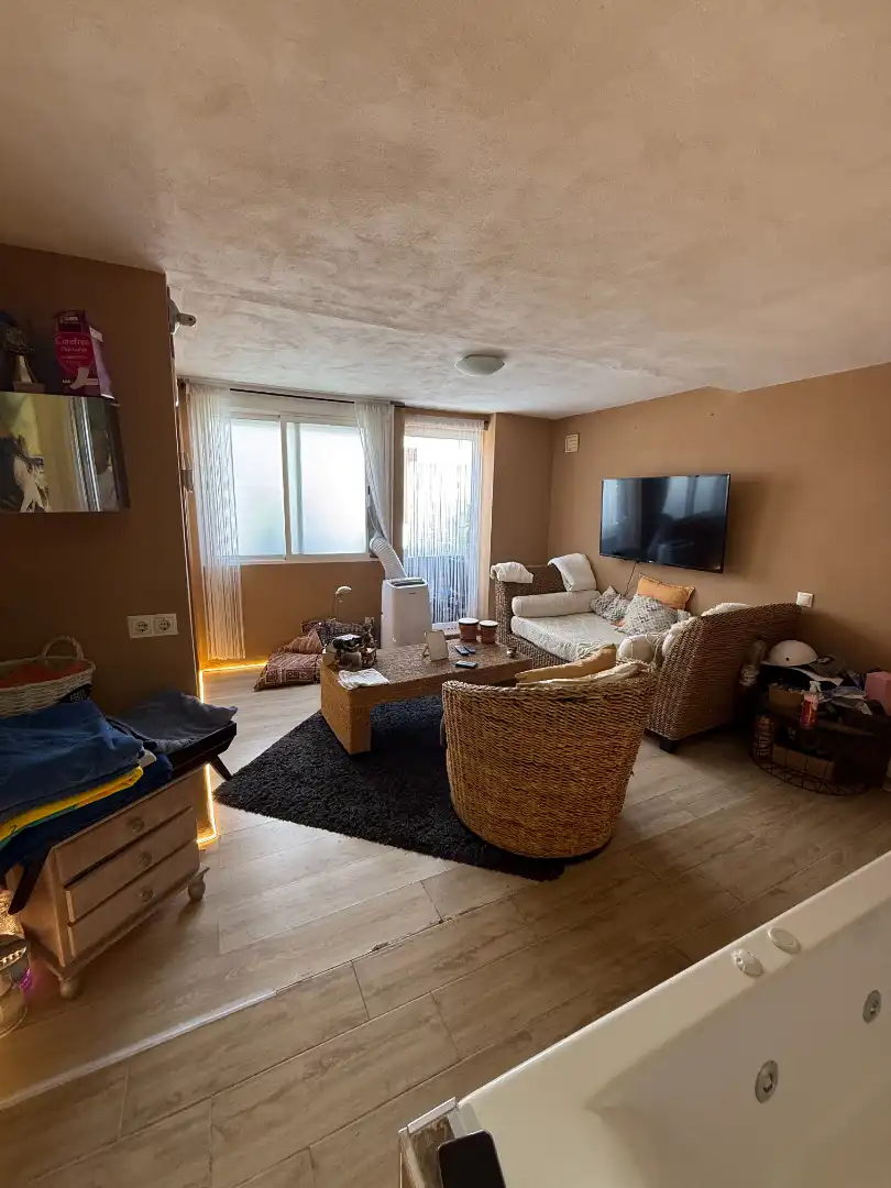 Sala de estar de Casa adosada en venta en Vinaròs con Aire acondicionado, Horno y Balcón