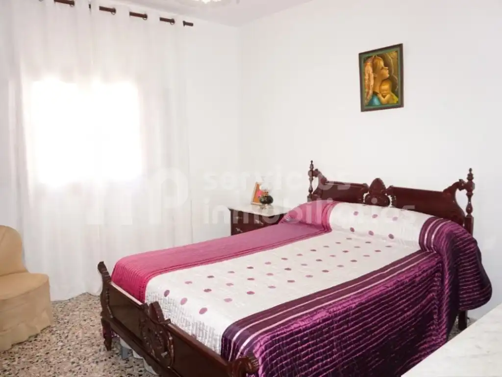 Habitación de Casa adosada en venta en Benamocarra con Jardín privado, Terraza y Amueblado
