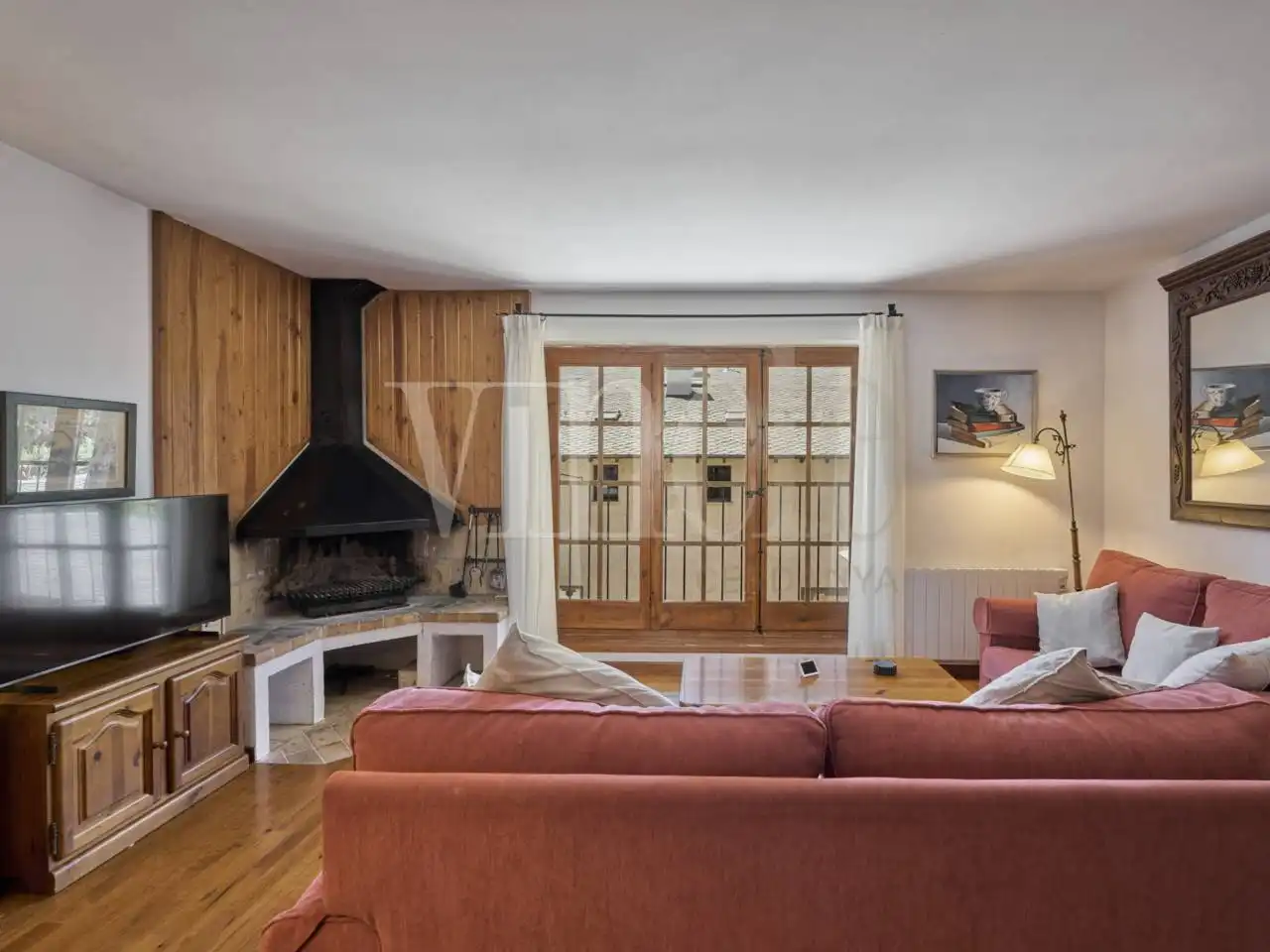 Sala de estar de Casa adosada en venta en Urús con Parquet y Terraza