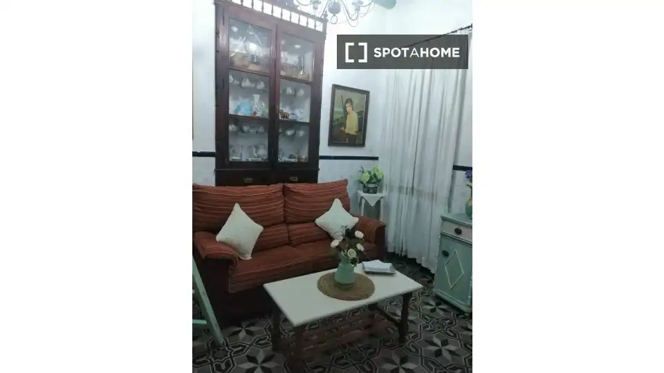 Sala d'estar de Apartament per a compartir en Encinasola amb Aire condicionat, Terrassa i Moblat