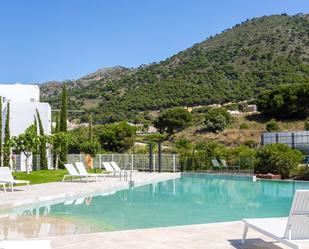 Swimming pool of Single-family semi-detached for sale in Mijas  with Air Conditioner, Heating and Private garden