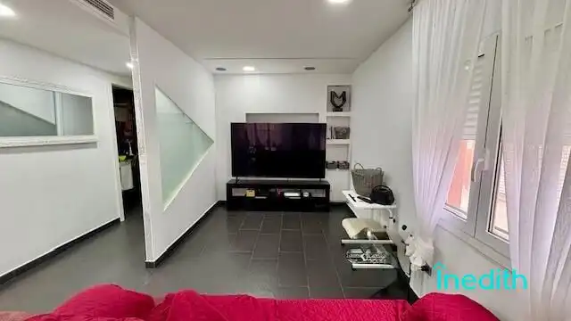 Sala d'estar de Casa o xalet en venda en Cunit amb Aire condicionat, Calefacció i Jardí privat
