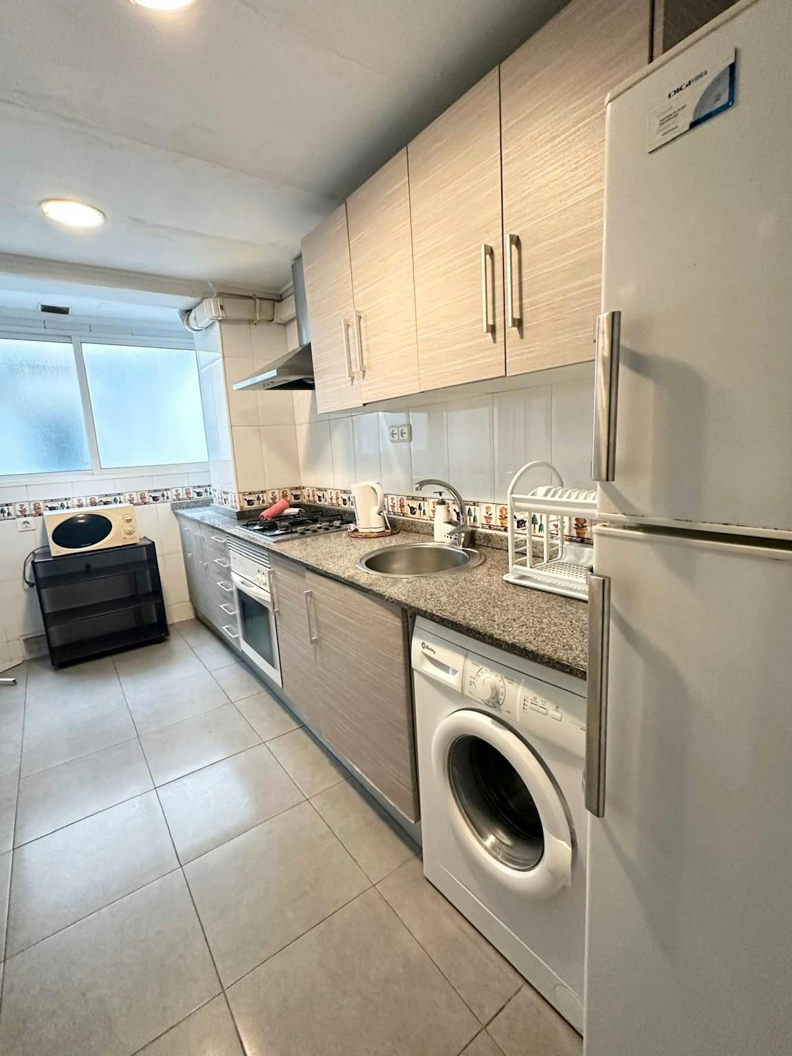 Kitchen of Flat to rent in  Valencia Capital  with Air Conditioner, Heating and Private garden