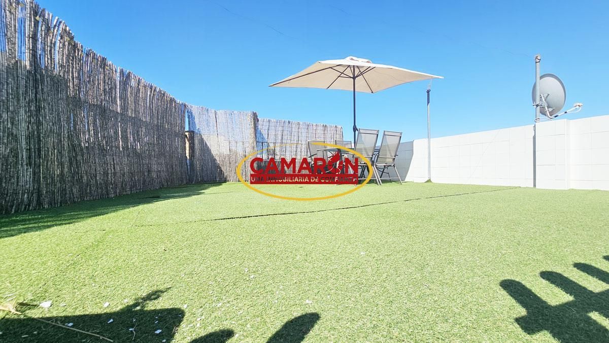 Jardí de Casa adosada en venda en Coria del Río amb Terrassa