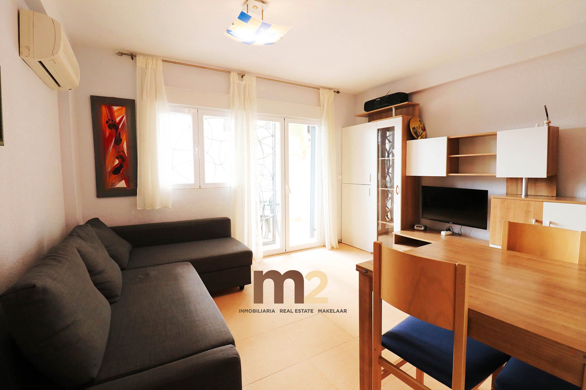 Living room of Apartment for sale in Guardamar del Segura  with Air Conditioner, Terrace and Furnished