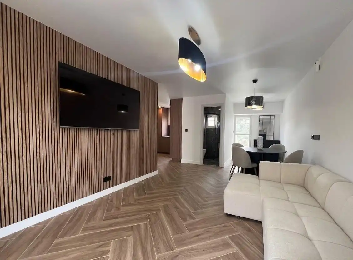 Sala d'estar de Casa adosada en venda en La Nucia amb Aire condicionat, Terrassa i Piscina comunitària
