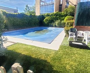 Swimming pool of Single-family semi-detached for sale in  Madrid Capital  with Heating, Private garden and Terrace