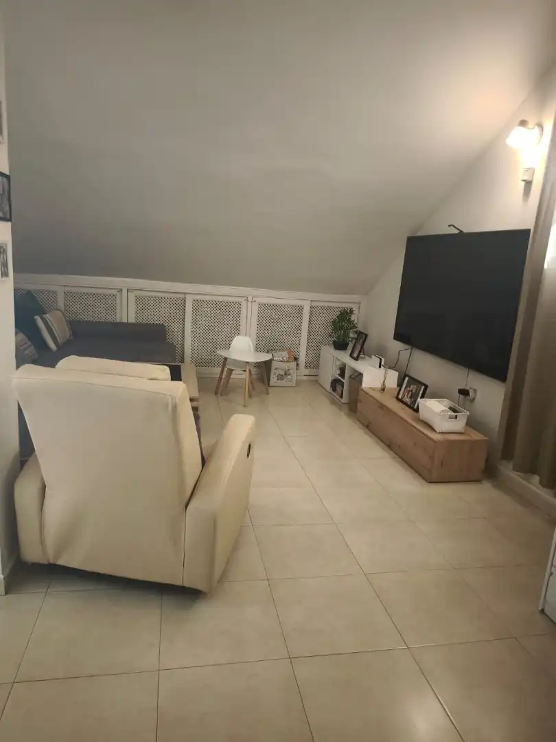 Sala de estar de Casa adosada en venta en Melilla con Aire acondicionado, Jardín privado y Terraza