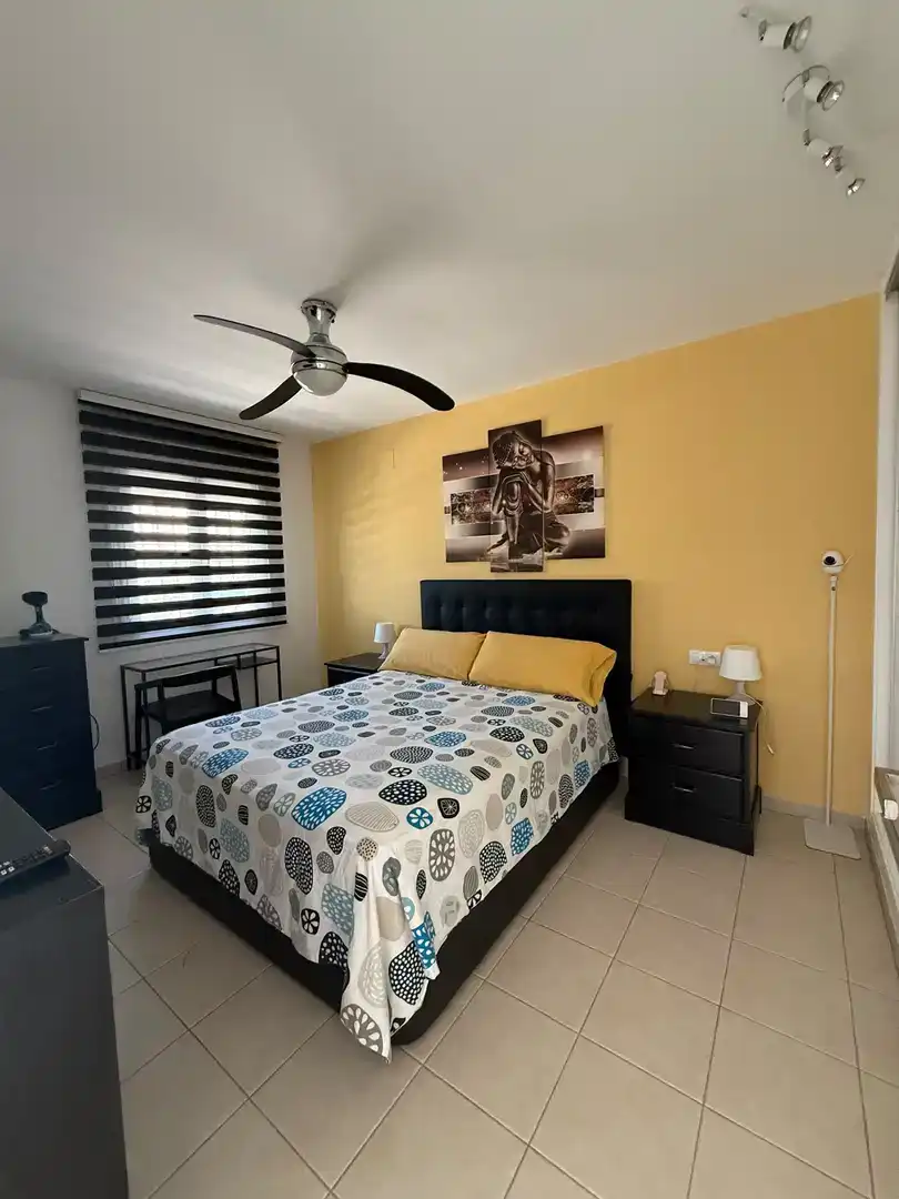 Dormitori de Apartament de lloguer en El Verger amb Aire condicionat, Jardí privat i Piscina