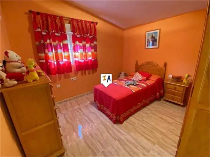 Schlafzimmer von Einfamilien-Reihenhaus zum Verkauf in Íllora mit Terrasse, Abstellraum und Schwimmbad