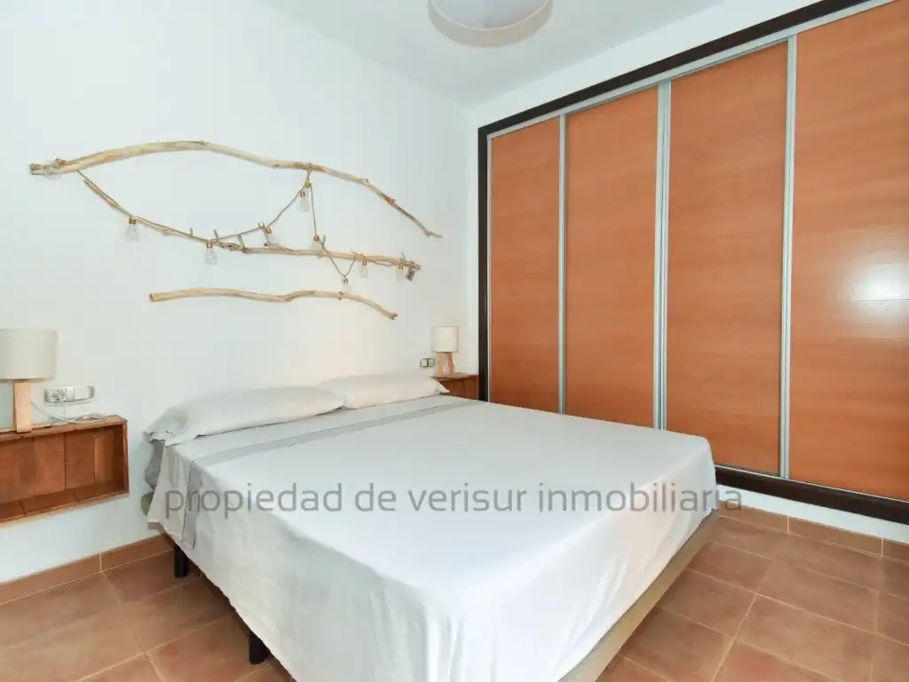 Habitación de Apartamento de alquiler en Águilas con Aire acondicionado, Jardín privado y Piscina