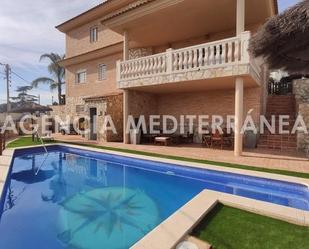 Piscina de Casa o xalet en venda en Torrent amb Aire condicionat, Jardí privat i Terrassa