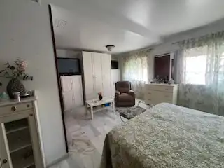 Bedroom of Detached homes for sale in Fuengirola  with Air Conditioner, Storage room and Community pool