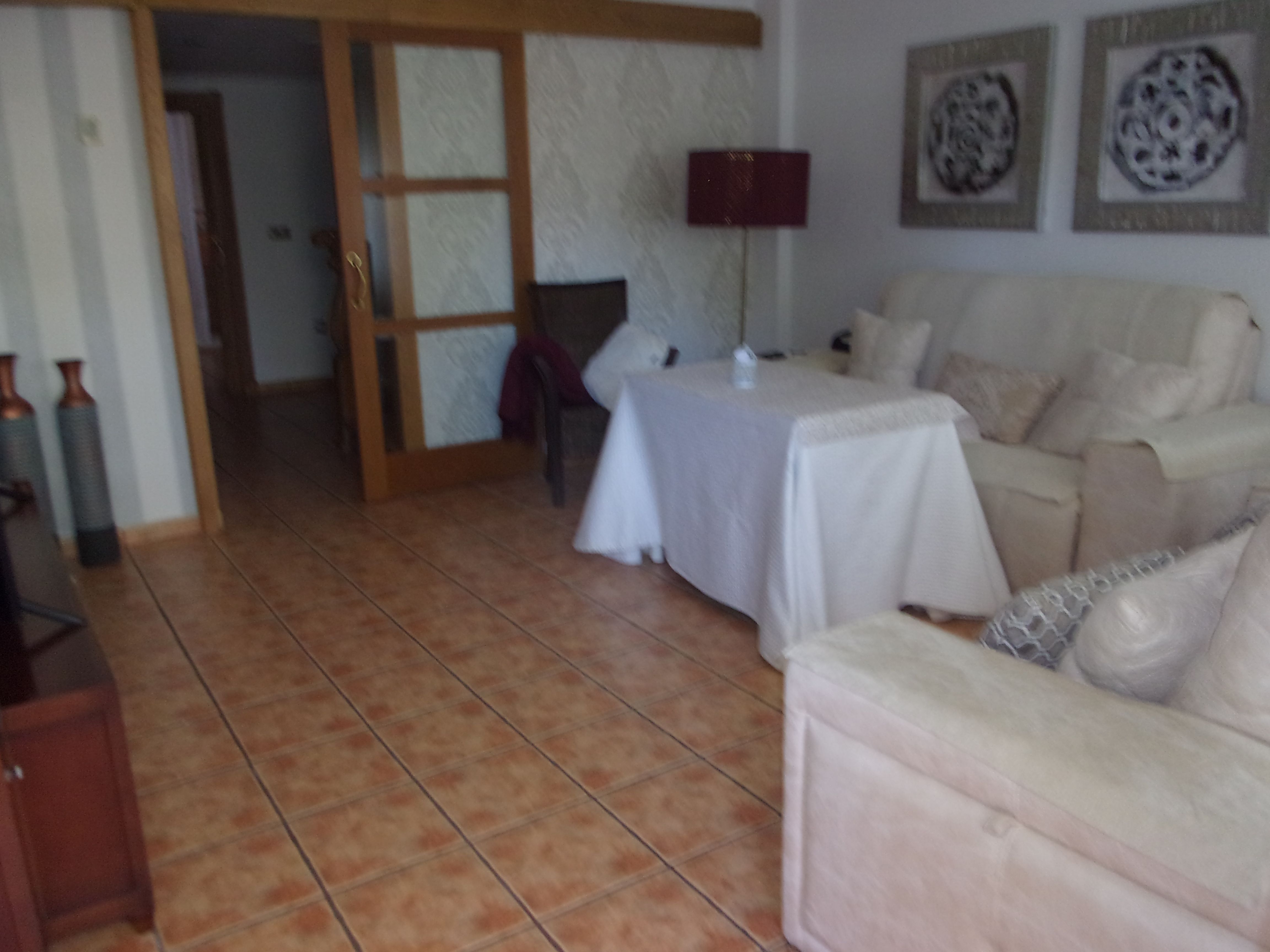 Sala d'estar de Casa adosada en venda en Lorca