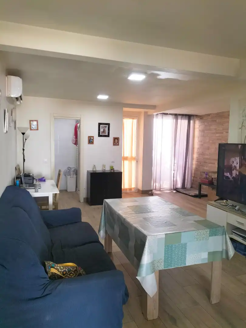 Sala de estar de Casa adosada en venta en Sanlúcar la Mayor con Aire acondicionado