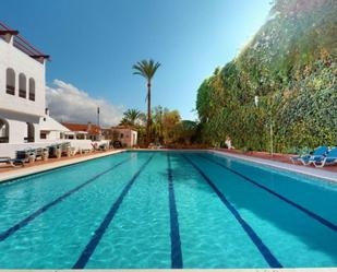 Swimming pool of Duplex for sale in Marbella