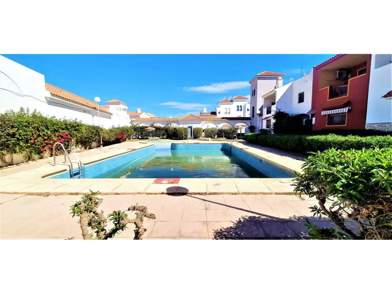Swimming pool of Detached homes for sale in Roquetas de Mar  with Terrace, Furnished and Community pool