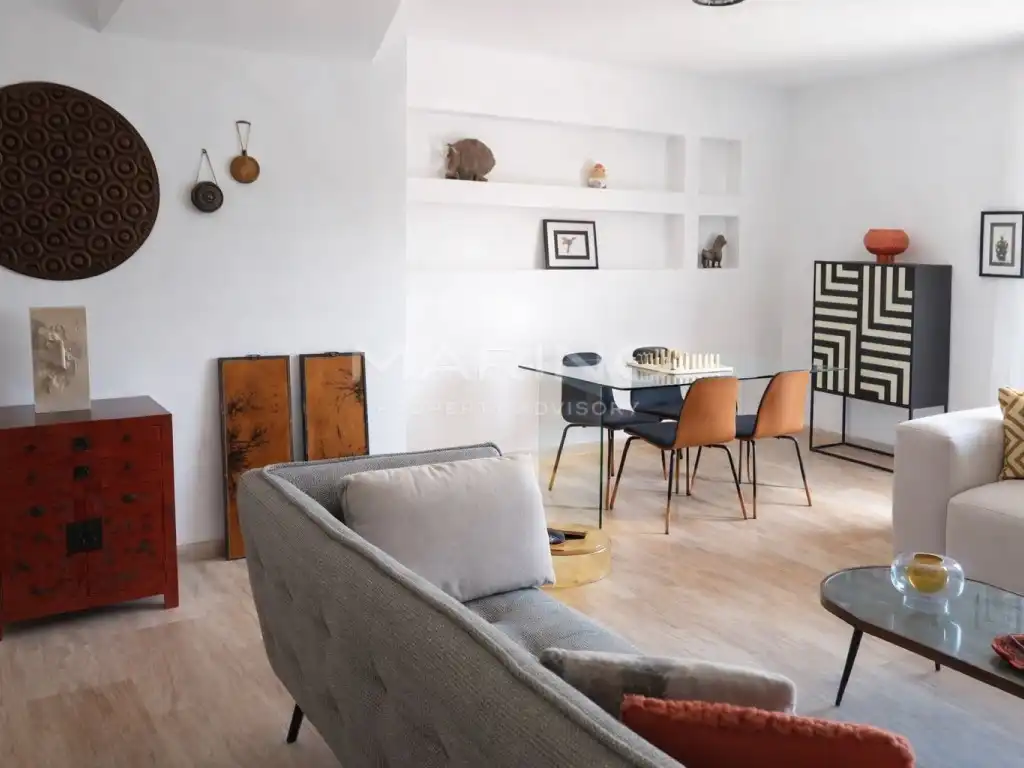 Sala d'estar de Casa adosada en venda en Sitges amb Aire condicionat, Terrassa i Piscina
