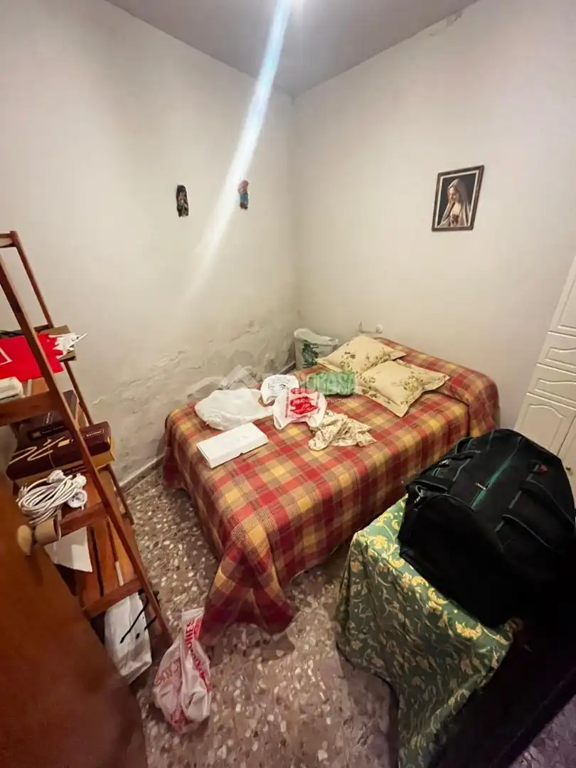 Habitación de Casa adosada en venta en Puertollano con Calefacción