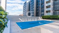 Swimming pool of Flat for sale in  Madrid Capital  with Air Conditioner, Heating and Private garden