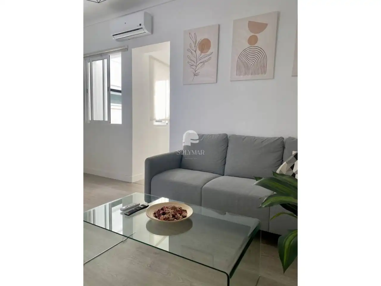 Sala d'estar de Casa adosada de lloguer en Vélez-Málaga amb Aire condicionat, Terrassa i Moblat