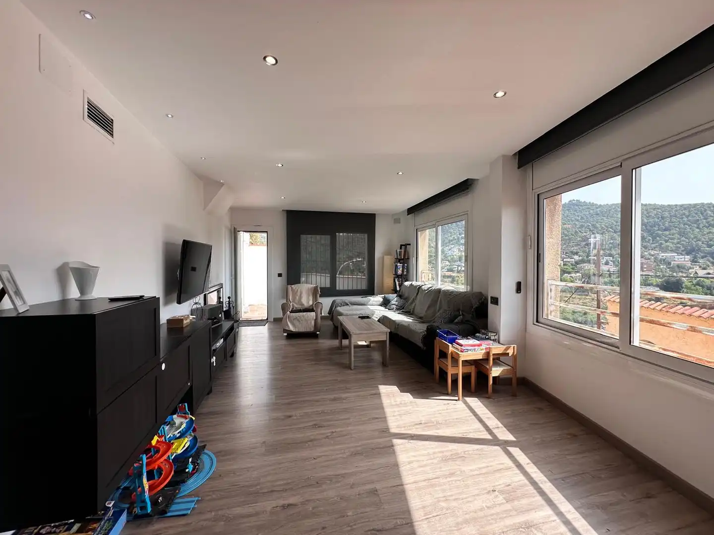Sala d'estar de Casa adosada en venda en Castellar del Vallès amb Aire condicionat, Calefacció i Parquet