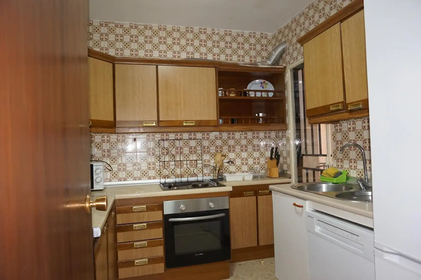 Cuina de Pis de lloguer en Granada amb Calefacció i Moblat