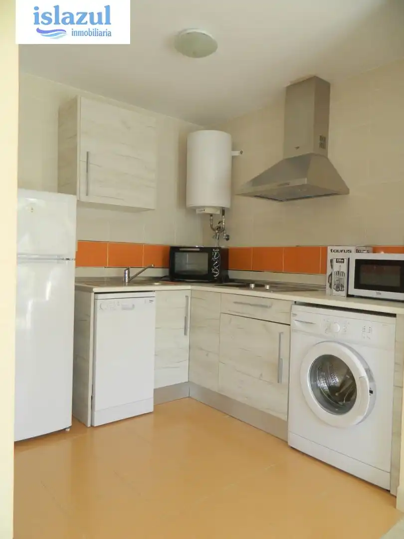 Cocina de Apartamento de alquiler en Isla Cristina con Aire acondicionado, Jardín privado y Terraza