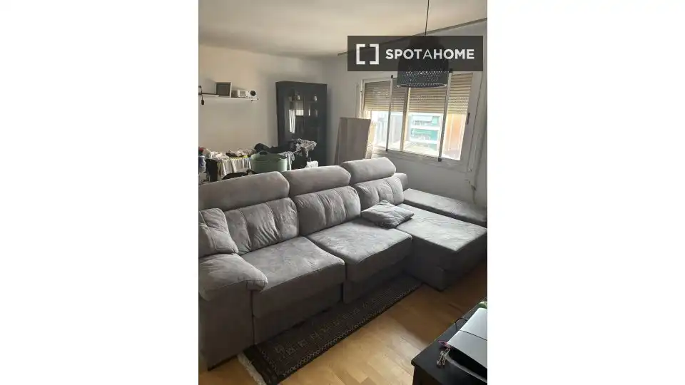 Sala de estar de Piso para compartir en Rubí con Aire acondicionado, Calefacción y Amueblado