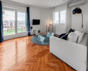 Sala d'estar de Apartament de lloguer en  Madrid Capital amb Aire condicionat