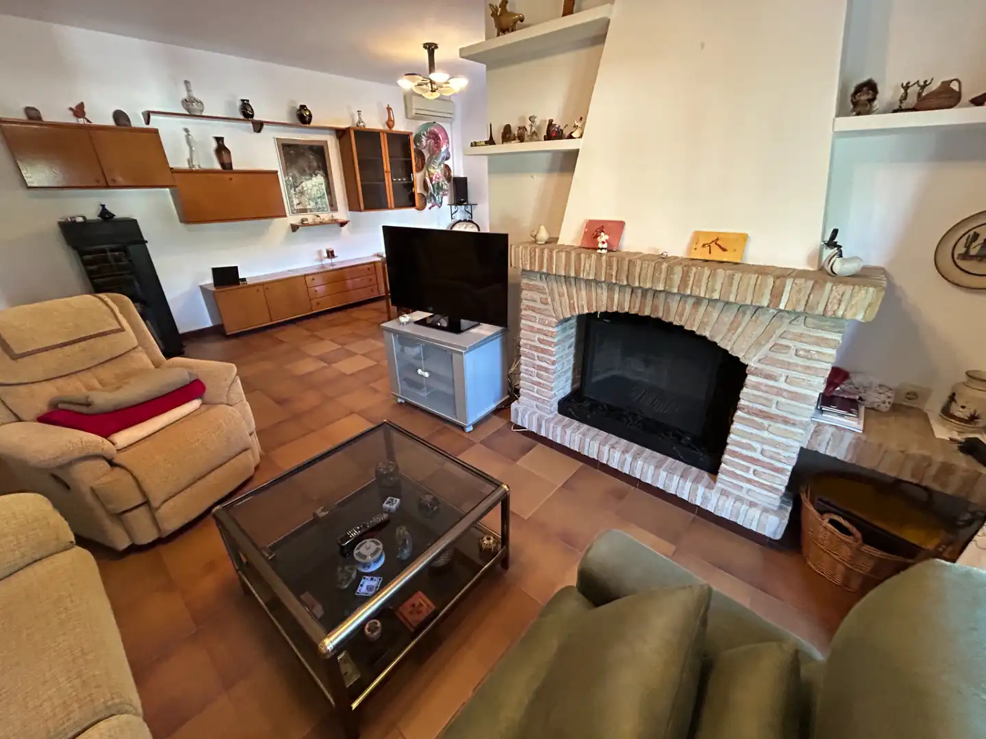 Sala d'estar de Casa adosada en venda en Vélez-Málaga amb Aire condicionat, Calefacció i Jardí privat