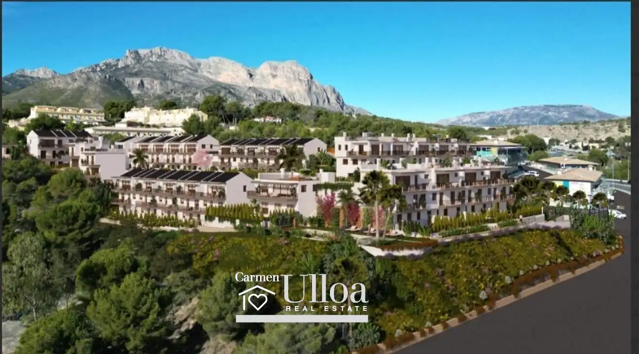 Vista exterior de Casa adosada en venda en L'Alfàs del Pi amb Calefacció, Jardí privat i Piscina comunitària