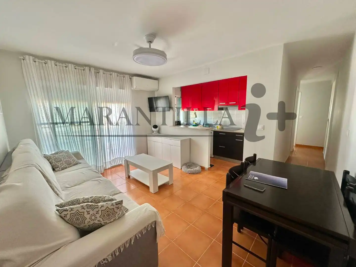 Sala de estar de Piso en venta en La Antilla con Aire acondicionado, Terraza y Amueblado