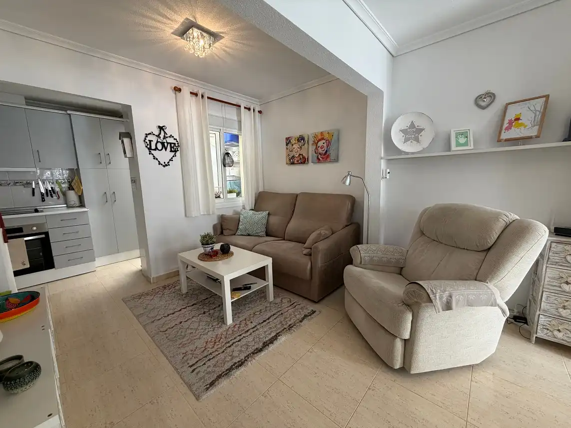 Sala de estar de Casa adosada en venta en Santa Pola con Aire acondicionado, Terraza y Amueblado