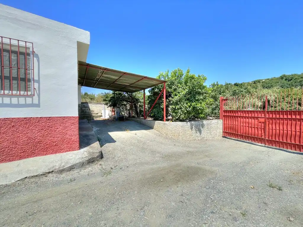 Vista exterior de Finca rústica en venda en Benamocarra amb Jardí privat, Moblat i Forn