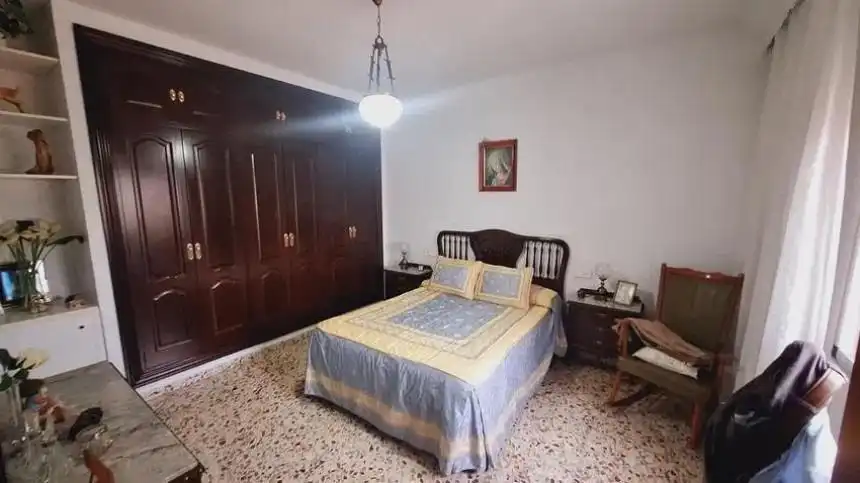 Habitación de Casa adosada en venta en Málaga con Aire acondicionado y Terraza