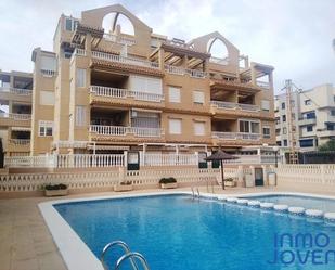 Piscina de Apartament de lloguer en El Campello amb Aire condicionat, Terrassa i Moblat