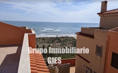 Vista exterior de Casa adosada en venda en Sueca amb Aire condicionat, Terrassa i Balcó