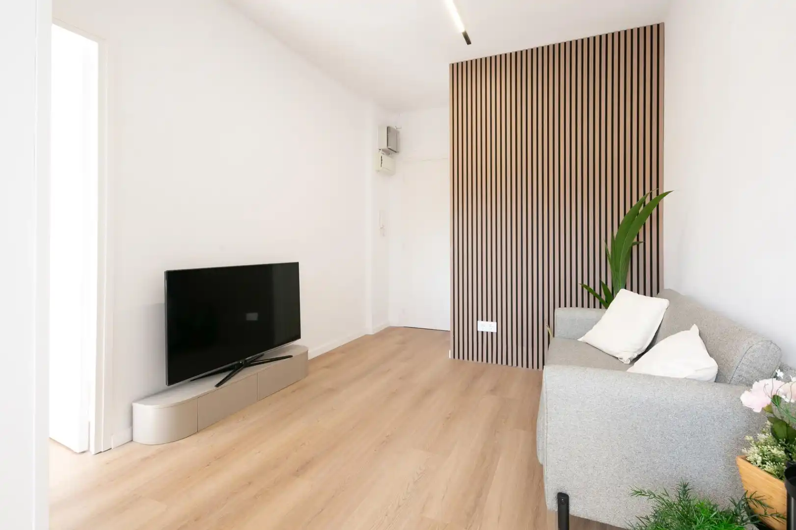 Sala d'estar de Pis de lloguer en L'Hospitalet de Llobregat amb Aire condicionat, Parquet i Moblat