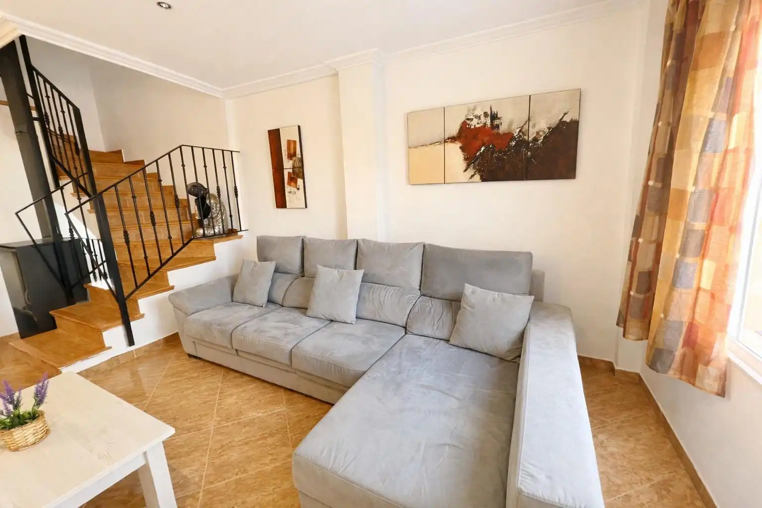Sala d'estar de Casa adosada en venda en Sagunto / Sagunt amb Aire condicionat, Calefacció i Terrassa