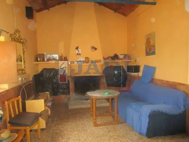 Sala d'estar de Finca rústica en venda en Valdepeñas amb Aire condicionat, Calefacció i Piscina