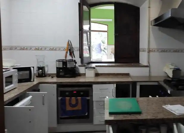 Cuina de Casa o xalet en venda en Mieres (Asturias) amb Calefacció, Jardí privat i Terrassa