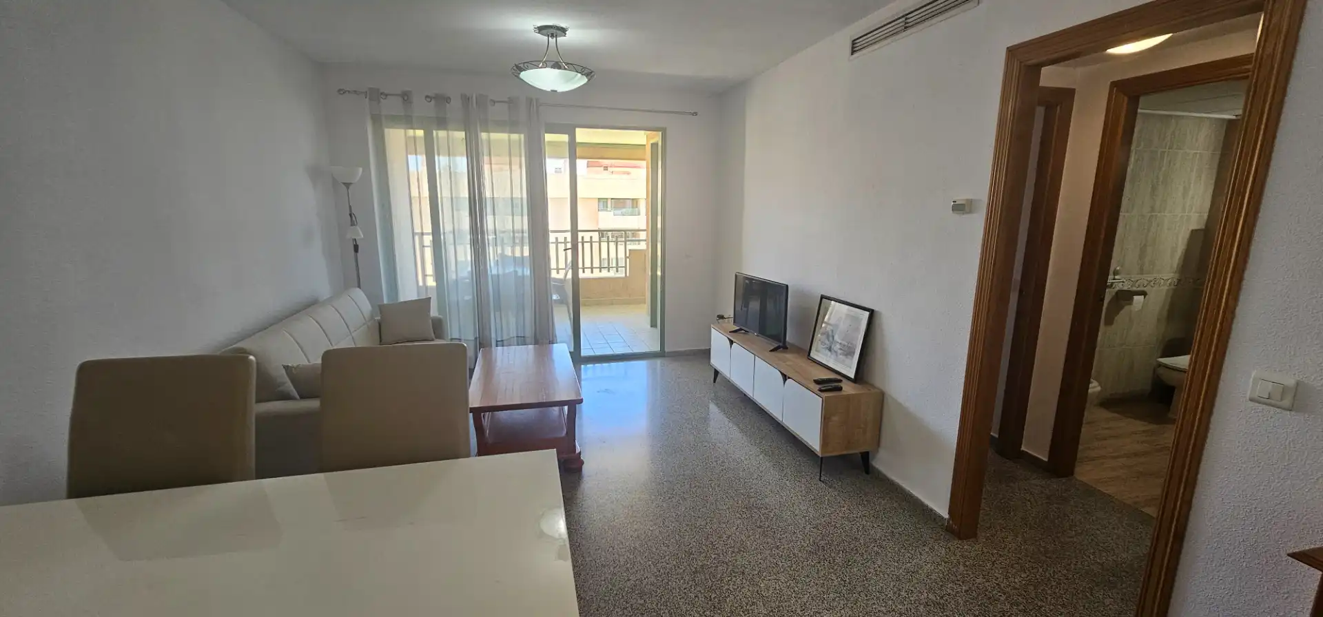 Sala d'estar de Apartament de lloguer en Alboraya amb Aire condicionat, Terrassa i Moblat