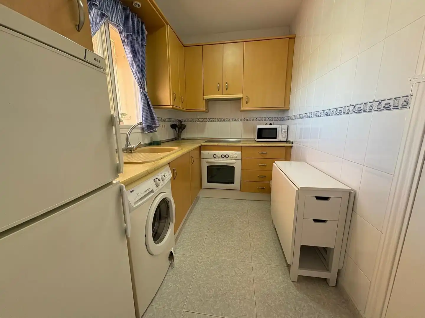 Cuina de Apartament de lloguer en Torrox amb Terrassa i Piscina comunitària